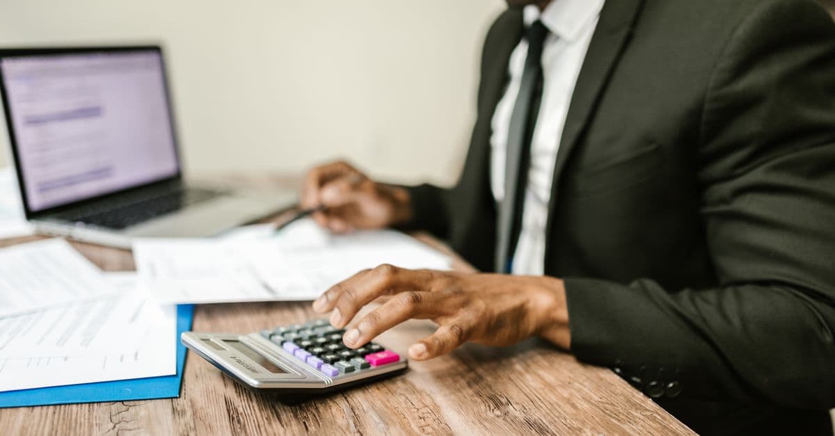 Business owner reconciling bank transactions in Xero on a laptop